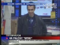 politist acuzat de furt